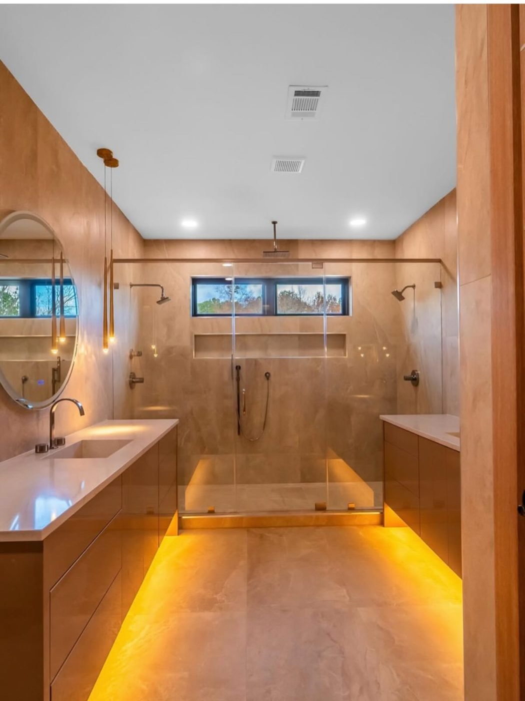 Warm large-format bath with walk-in shower